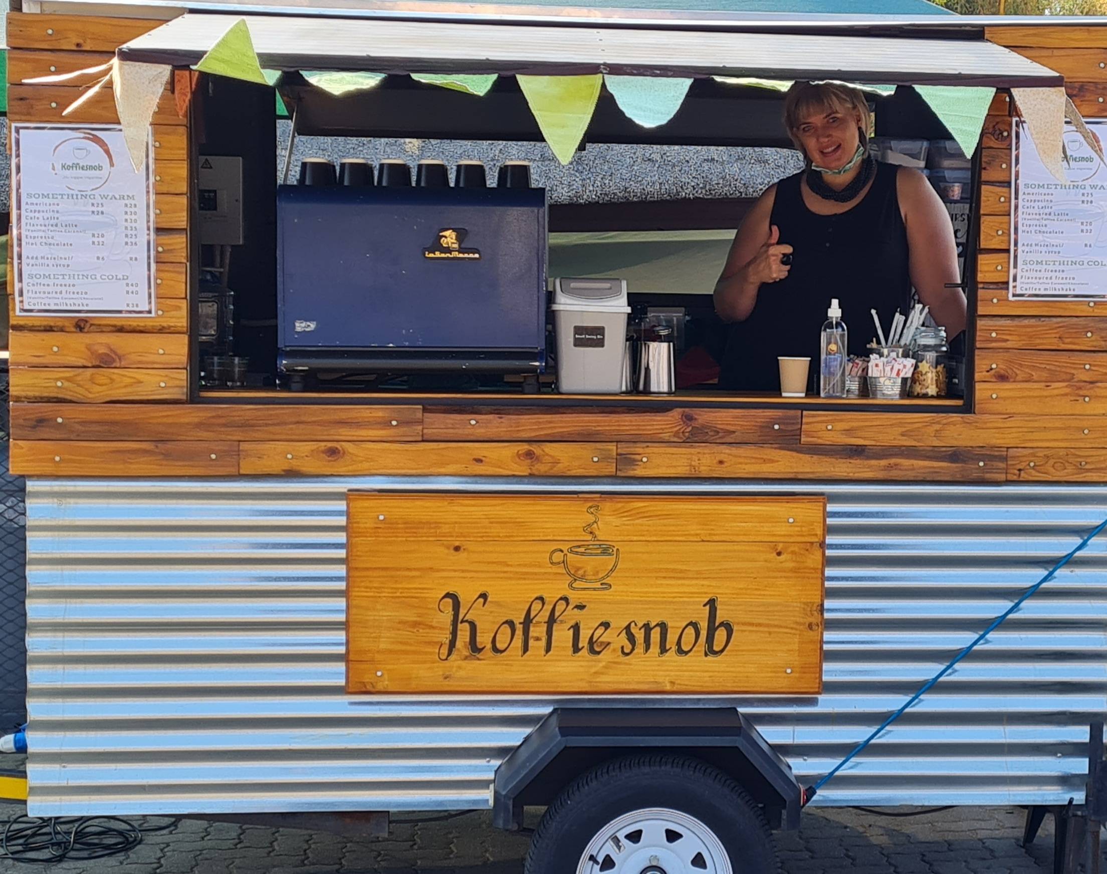 lady in mobile coffe trailer